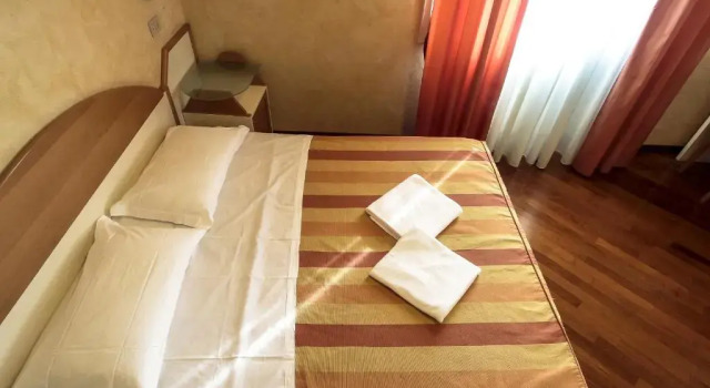 Четырёхместный номер Standard Hotel Soggiorno Athena