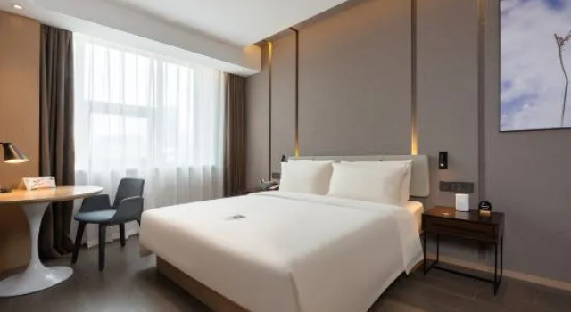 Семейный люкс с видом на горы Xinghai Golf Hotel
