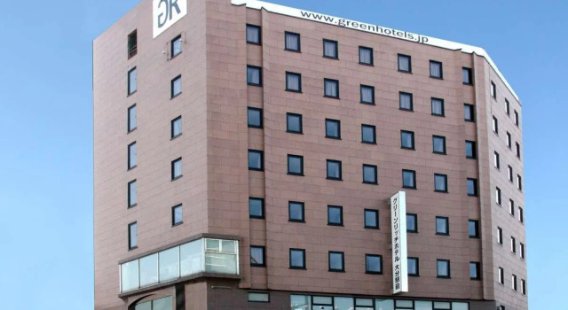 Кровать в общем номере Green Rich Hotel Oita Ekimae