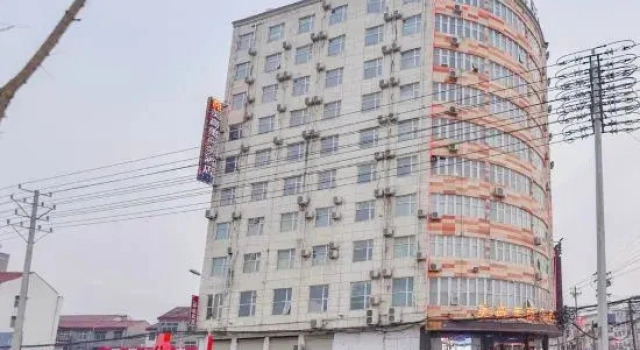Yucheng Meigaomei Business Hotel (Yucheng New Bus Station)
