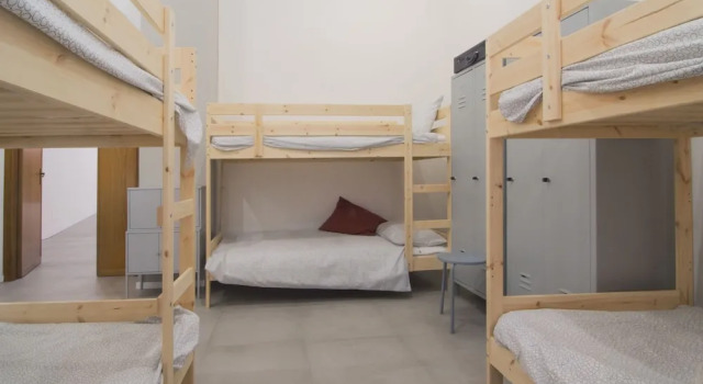 Bett im Wohnheim Hostelleria