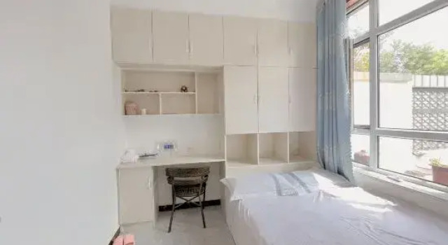 Люкс с 4 комнатами Mengzi Xingda Hotel (Honghe Stadium Honghe Prefecture Government Branch)