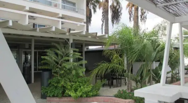 Кровать в общем номере Island Boutique Hotel