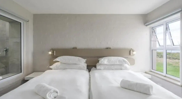 Коттедж с 2 комнатами с видом на море Blue Bay Lodge