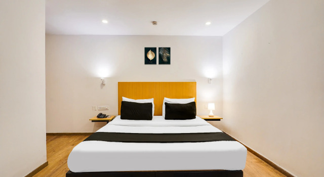 Super Oyo Townhouse Oak Spruce Hotels A2 Indiranagar, Забронировать Отель Индиранагар Бангалор, рядом с Больница Манипал