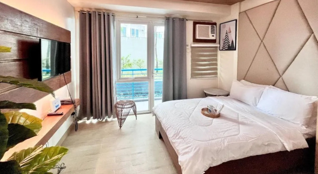 Relaxing Stay at One Madison Tower, Забронировать Апартаменты/квартира Апартаменты Илоило, рядом с Бизнес-парк Илоило, Апартаменты/квартира