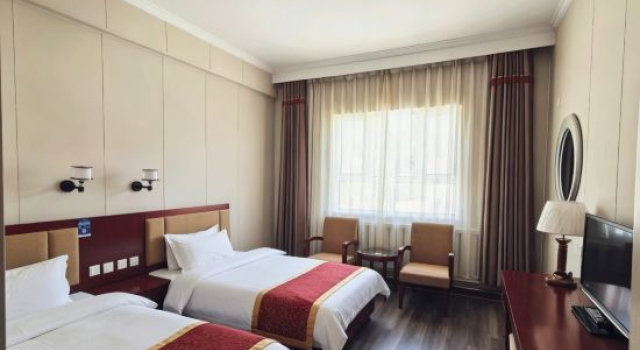 Kaiyuan Holiday Hotel, Boek Hotel Altay Xinjiang
