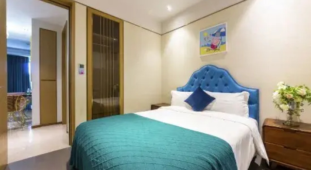 Люкс с 2 комнатами с балконом и с видом на море Sanya Haitang Bay Weilanse Seaview Holiday Apartment(Yate Duty Free City Store)