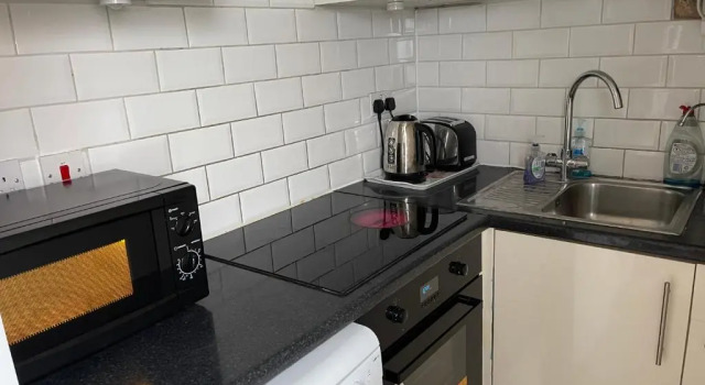 Апартаменты Hollybush Guest House