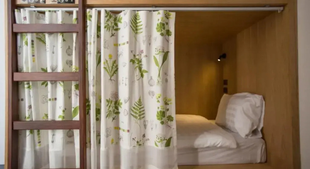 Кровать в общем номере Memmoth Cafe & Hostel in Lampang