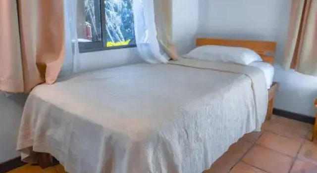 Четырёхместный номер Standard с балконом и с красивым видом из окна Hotel El Jardin