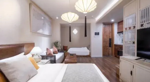 Четырёхместный семейный люкс с видом на внутренний двор Beijing Lezai Nanluo Countyard Hotel