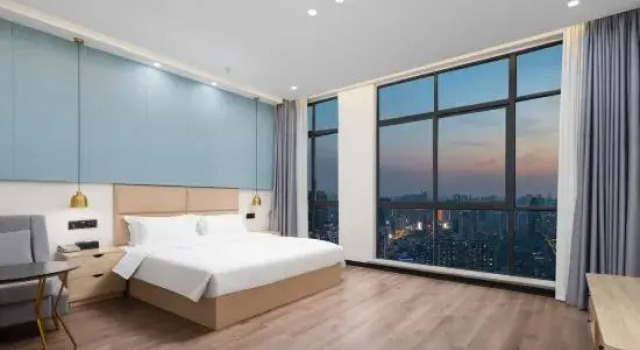 Люкс Deluxe Yafeng Hotel (Xinyang Libao Square Wanxiangcheng Branch)