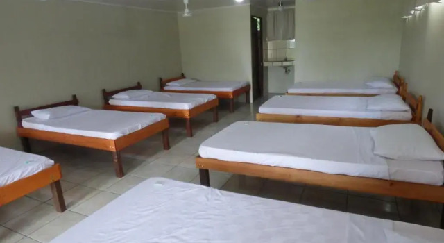 Кровать в общем номере Corcovado Beach Lodge