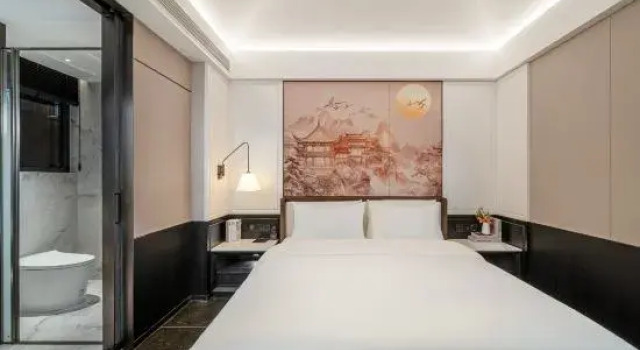 Четырёхместный семейный люкс Zhenyue Meijing Hotel (Qinzhou Baishihu Park Wuyue Plaza)