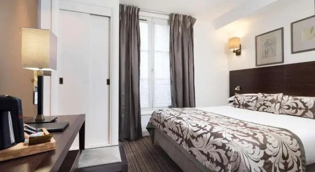 Номер Deluxe Hôtel Paris Louvre Opéra