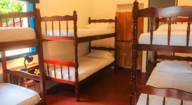 Кровать в общем номере Adios Amigos Hostel
