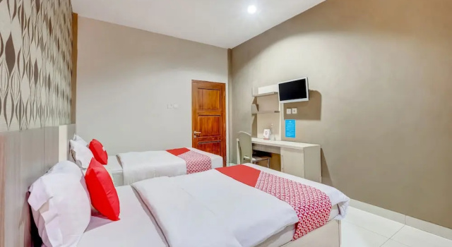 Deluxe Twin room OYO Flagship Tembok Batu Residence