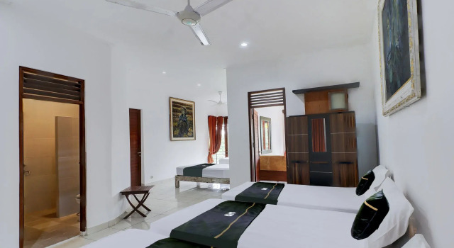 Кровать в общем номере Collection O Bali Near Desa Mas Ubud