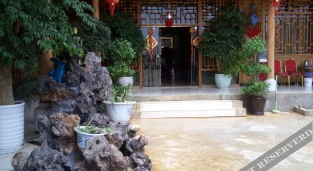 Puzhehei Chengshi Nongyuan Hotel