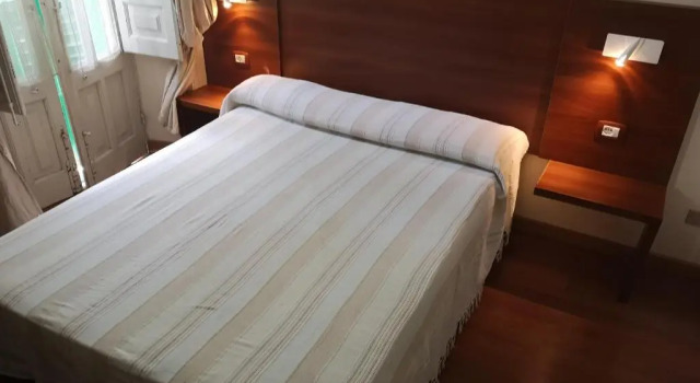 Кровать в общем номере B&B Casa Laganà