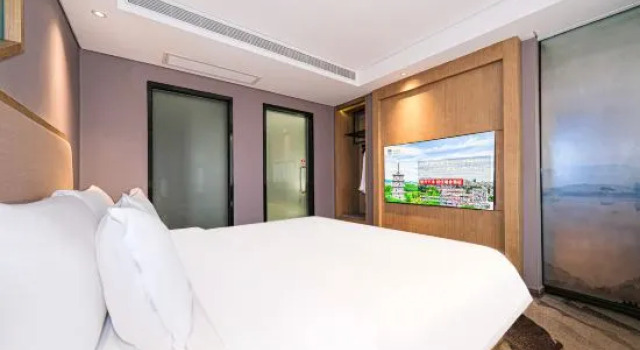 Люкс Deluxe Ruishe Hotel (Xintian City Plaza, Licheng)