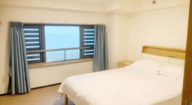 Люкс с 3 комнатами с видом на море Danzhou Mingyang Homestay