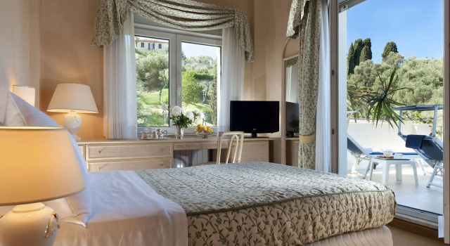 Doria Park Hotel, Забронировать Отель Леричи Итальянская Ривьера, рядом с Пляж Lerici