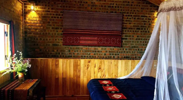 Кровать в общем номере Sapa Hmong Bungalow Homestay