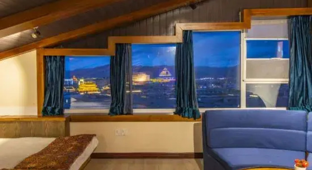 Кровать в общем номере Xiangsheli Foguang Qifu Boutique Inn