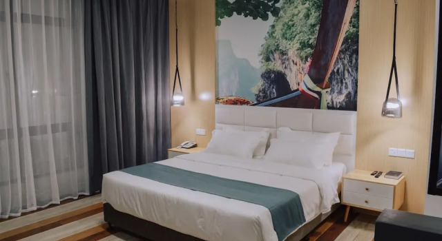 O podwyższonym standardzie pokój Fan's Hotel Baybay