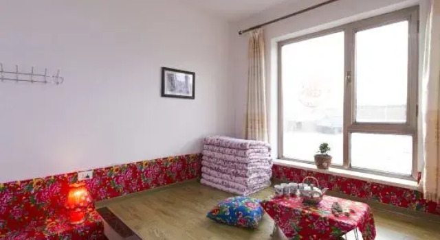 Кровать в общем номере Kongjia Hostel