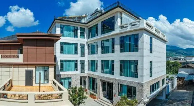 MUHAN Homestay, Prenota Hotel Hotel a Lijiang con parcheggio, Parcheggio