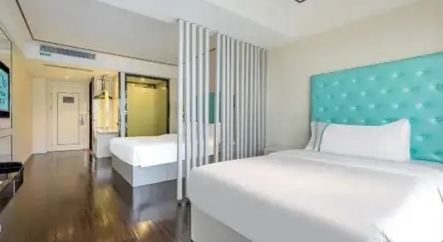 Номер Business XANA LITE Hotel Shixi Metro Station