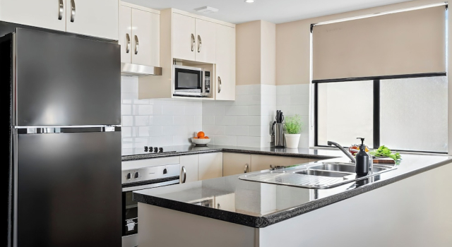 Апартаменты с 2 комнатами с балконом Cityville Apartments & Motel