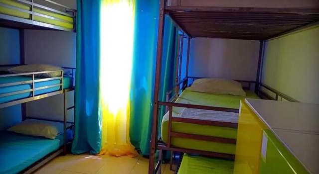 Кровать в общем номере Butterfly Hostel