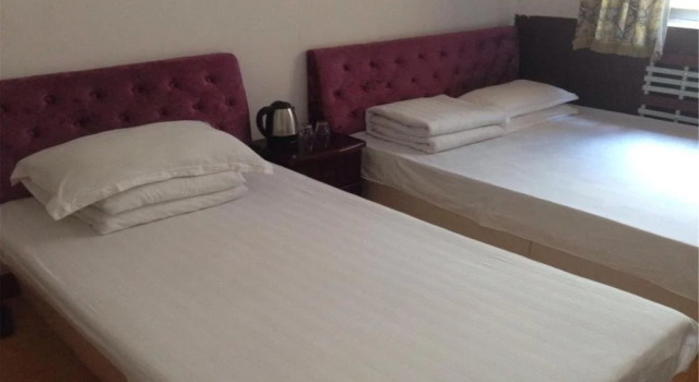 Baihe Hotel Dalian, Boek Hotel Zhongshan 