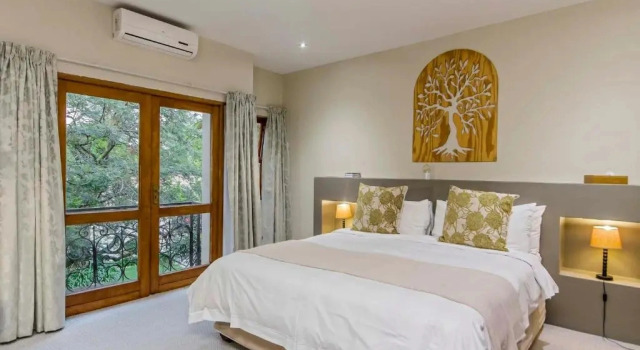 Двухместный люкс Deluxe с видом на сад Dunton Guest House