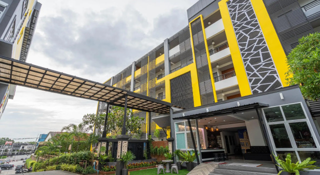 Кровать в общем номере SB Living Place Hotel Phuket Town