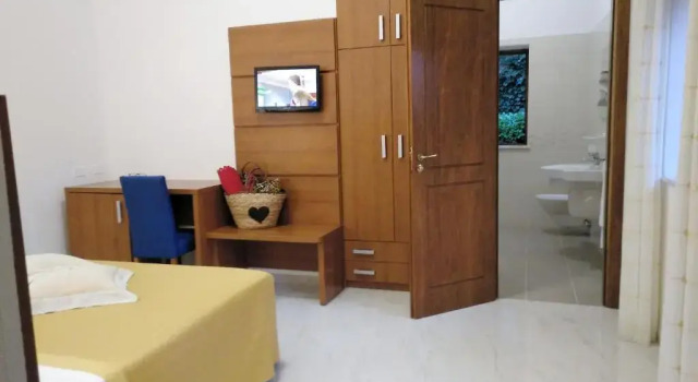 Четырёхместный номер Standard Villaggio Turistico La Mantinera - Hotel