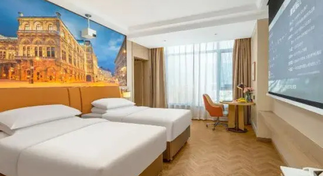 Семейный люкс Vienna Hotel（Xingshan High Speed Rail Station Store）