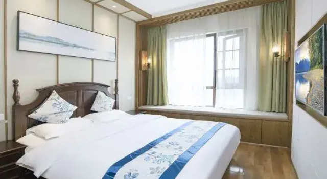 Люкс Emeishan Danyueshan Vacation Homestay (Emeishan High-Speed Railway Station Baoguo Temple)