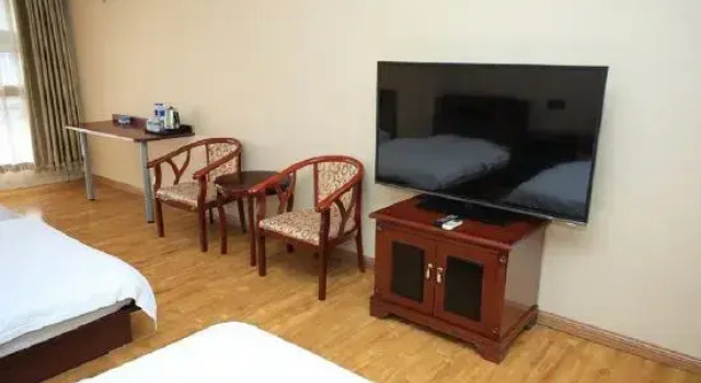 Кровать в общем номере Wutong Hotel (Beijing Changping University of Petroleum)