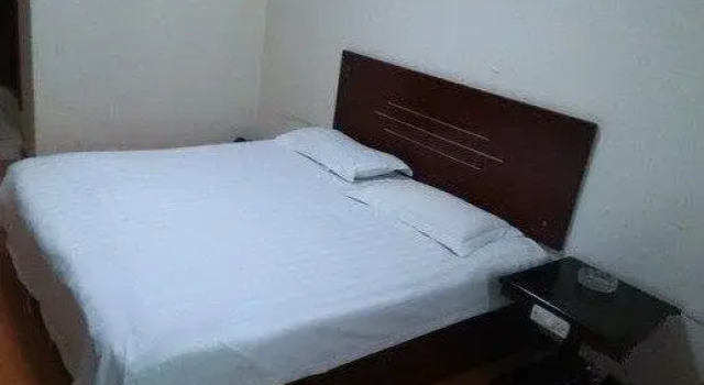 Xingxinyuan Business Hotel, Prenota Hotel Enshi Prefecture Cina