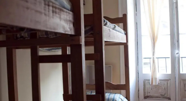 Кровать в общем номере BA Stop Hotel House