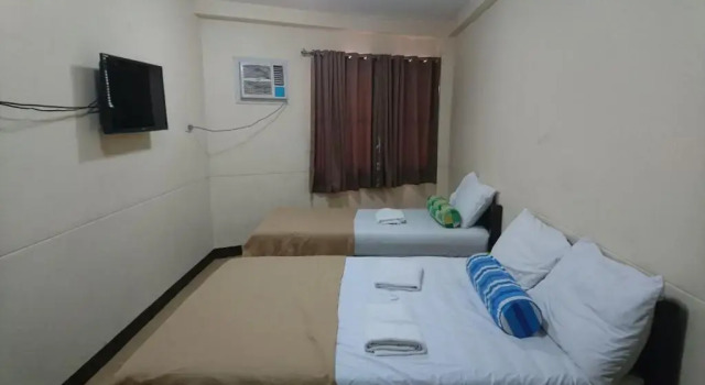 Трёхместный номер Deluxe Calamba Pension Plaza