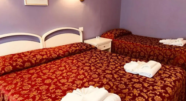 Четырёхместный номер Comfort Hotel Duca Della Corgna
