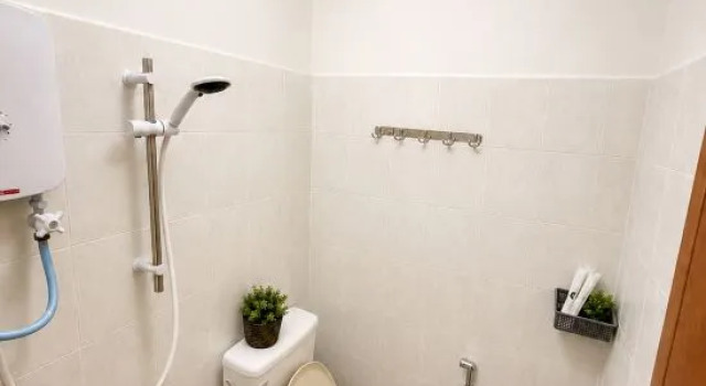 Кровать в общем номере Tekoma Resort Taman Negara