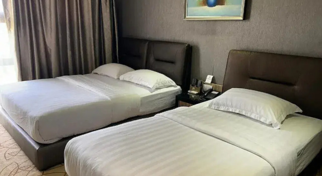 Luksusowy trzyosobowy pokój Milano Hotel
