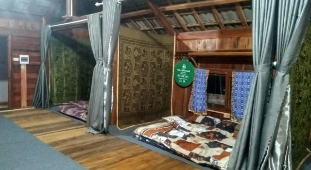 Кровать в общем номере Farmstay Ban Bua